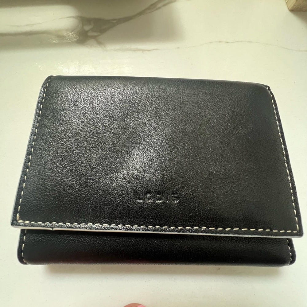 Black Lodi’s leather wallet